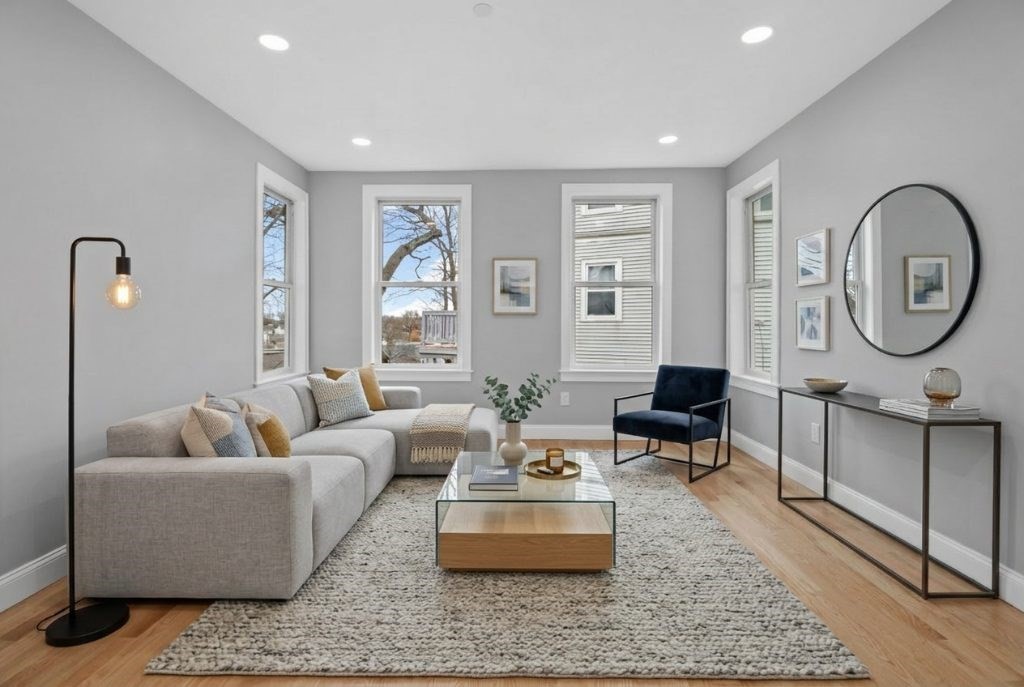 66 Stanley Street, Unit 2 Boston, MA 02125 - Photo 2 of 21 a living room with furniture and a large window
