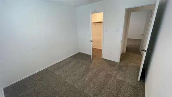 a view of a room that has a window in it