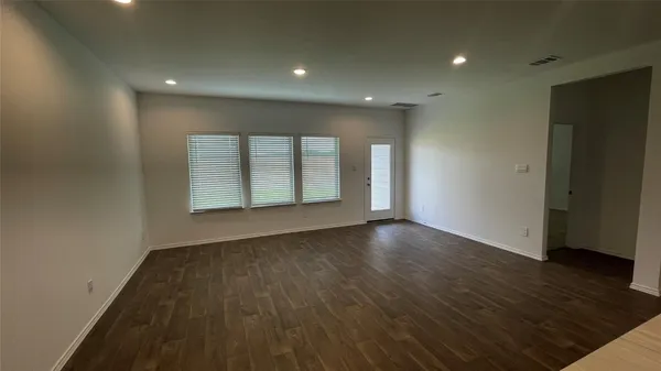 an empty room with windows