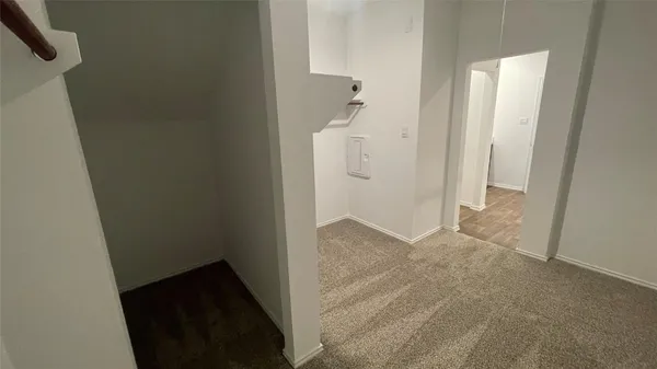 a bathroom with a sink toilet vanity and shower
