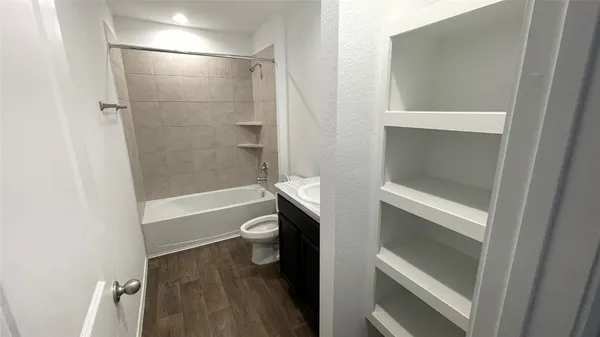 an empty room with an entryway door