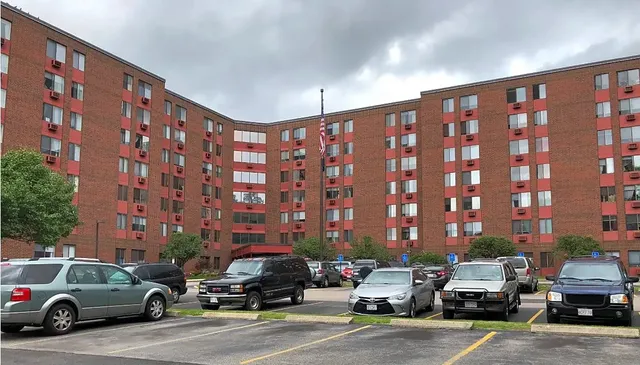 a cars parked in front of a building