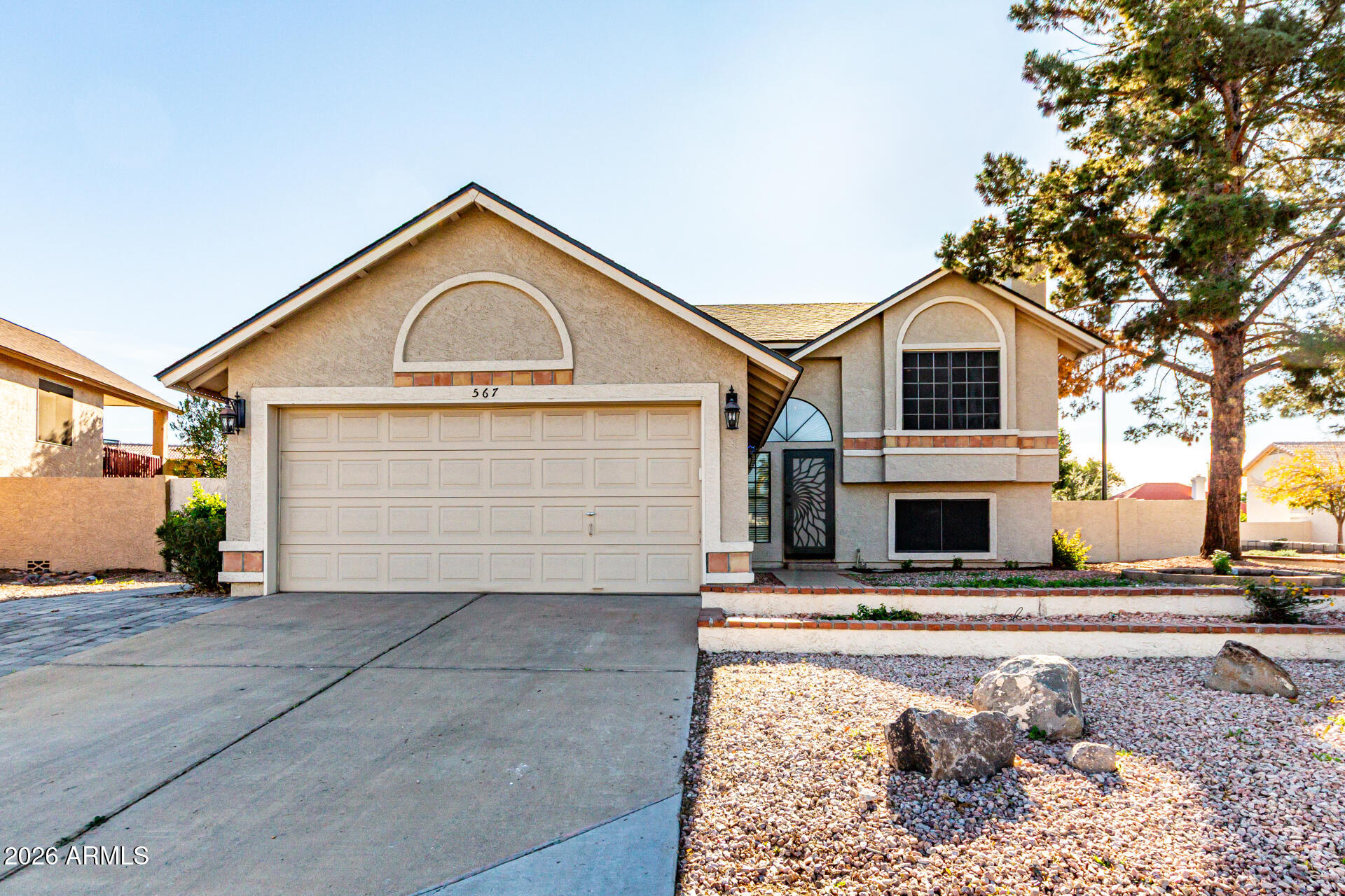 a view of house with yard
