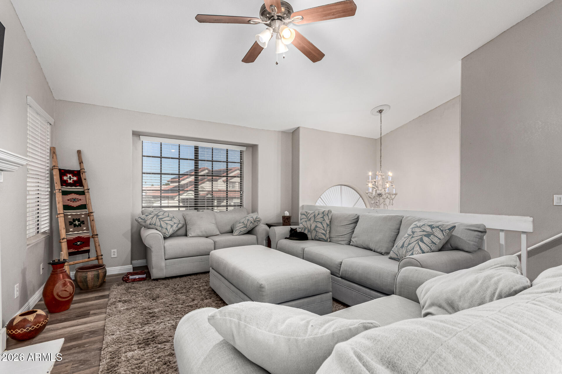 567 West Spur Avenue Gilbert, AZ 85233 - Photo 7 of 42 a living room with furniture or couch and a window