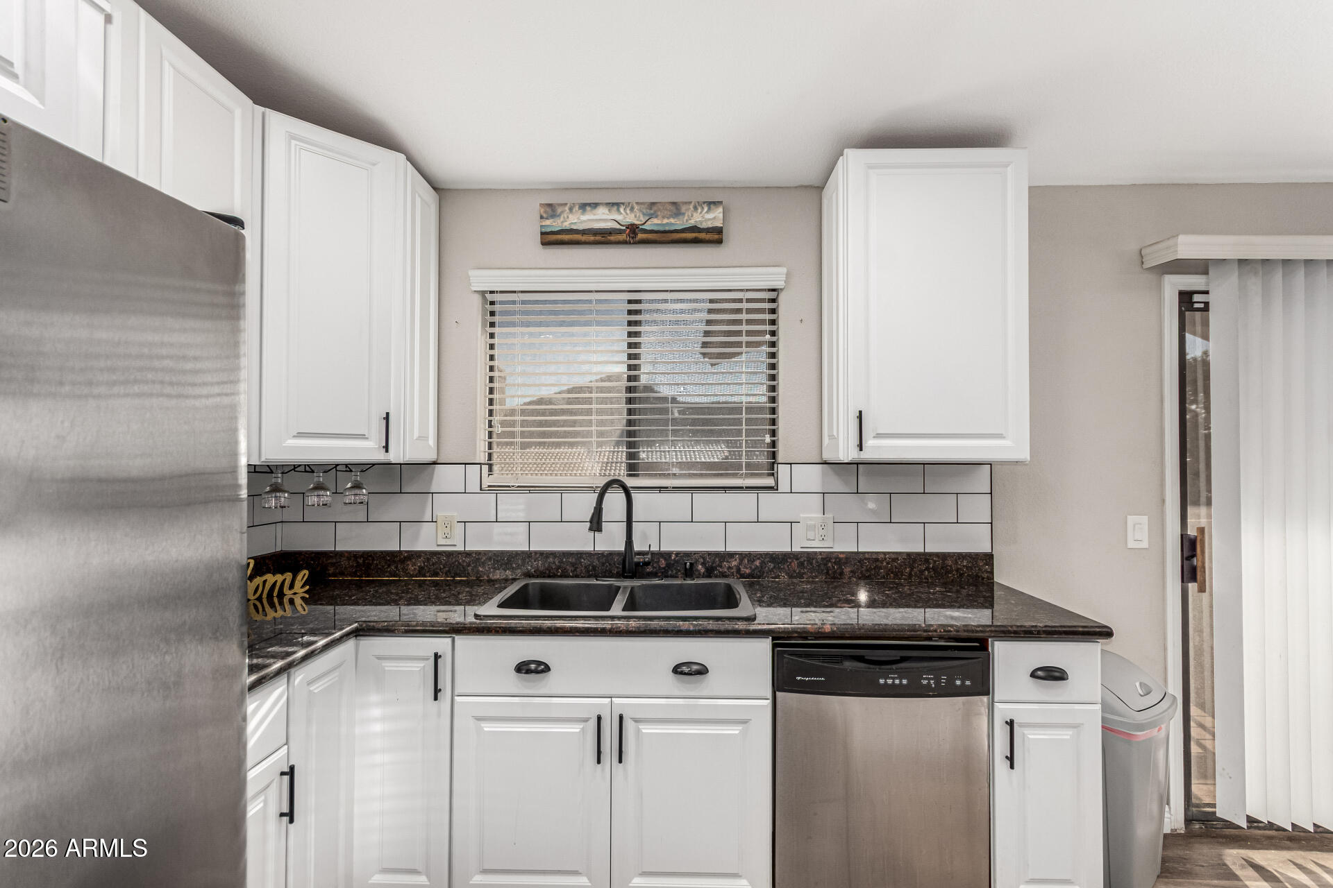 567 West Spur Avenue Gilbert, AZ 85233 - Photo 9 of 42 a view of a granite countertop sink