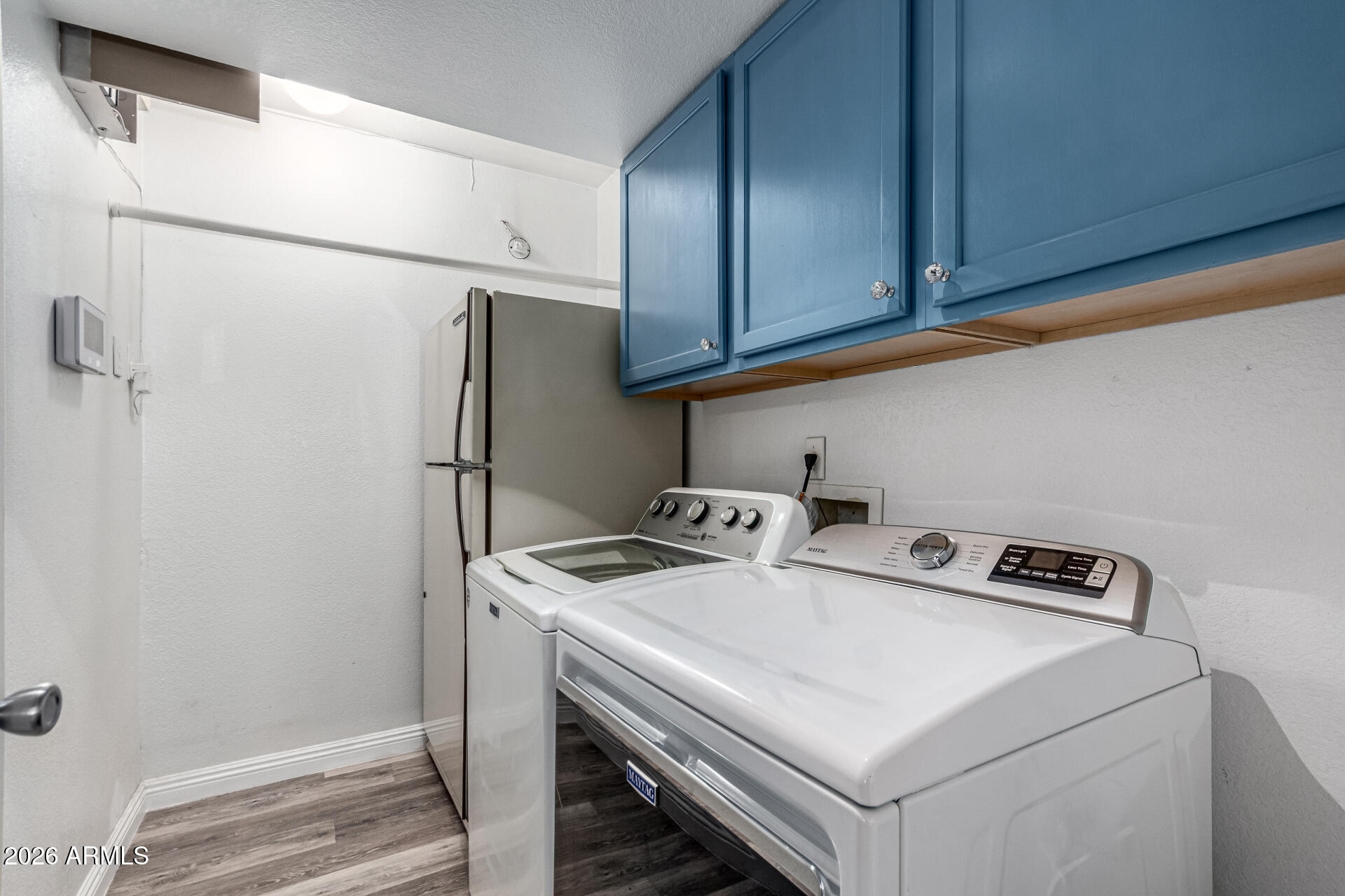 567 West Spur Avenue Gilbert, AZ 85233 - Photo 26 of 42 a utility room with dryer and washer
