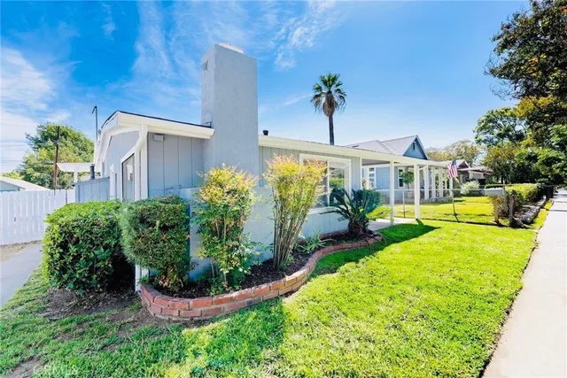 a view of a house with a garden