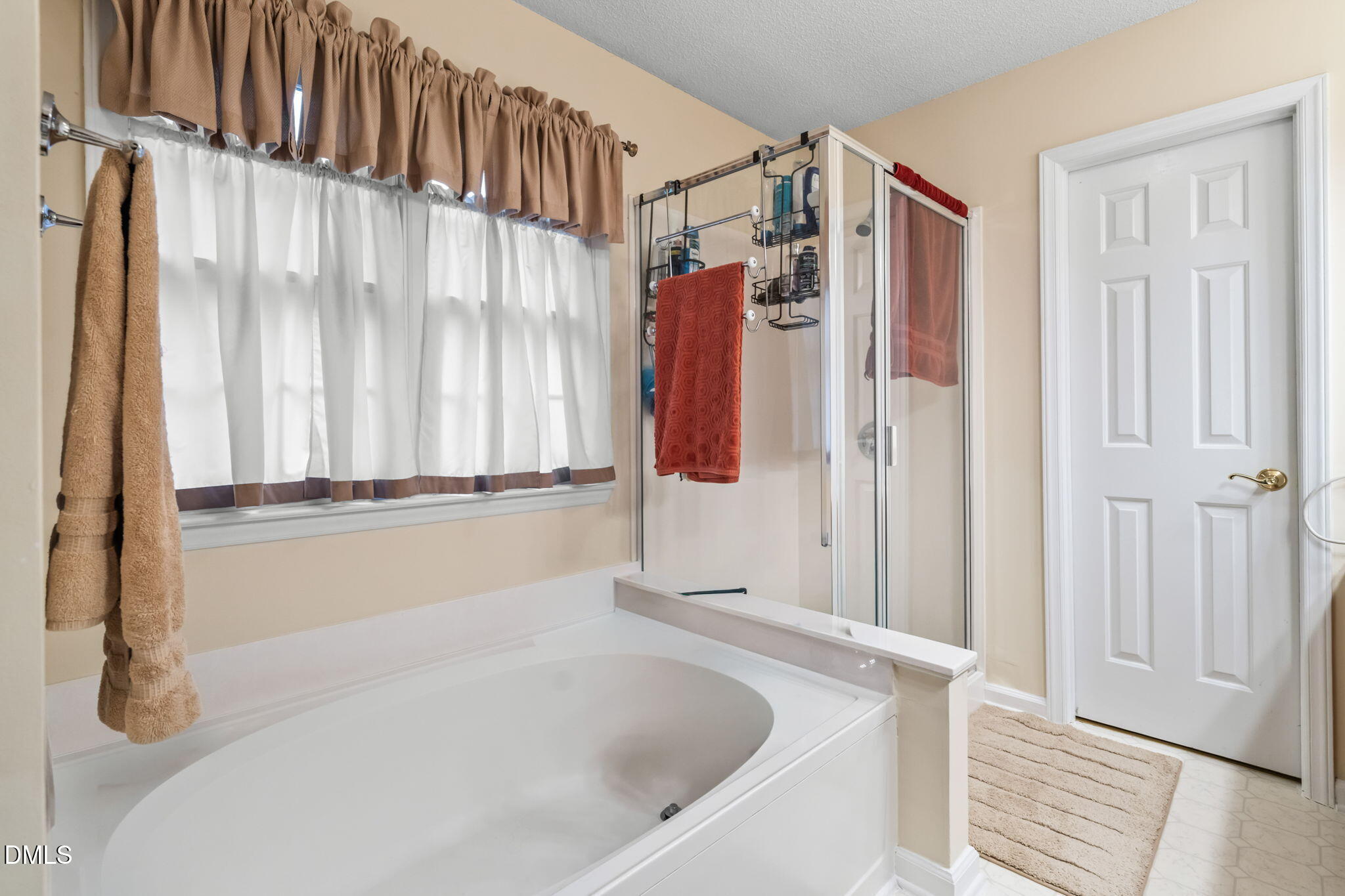 9104 Deerland Grove Drive Raleigh, NC 27615 - Photo 33 of 42 Primary Bath