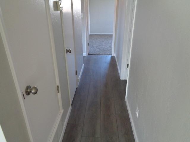270 Manning Avenue Reedley, CA 93654 - Photo 6 of 14 Hallway with new flooring