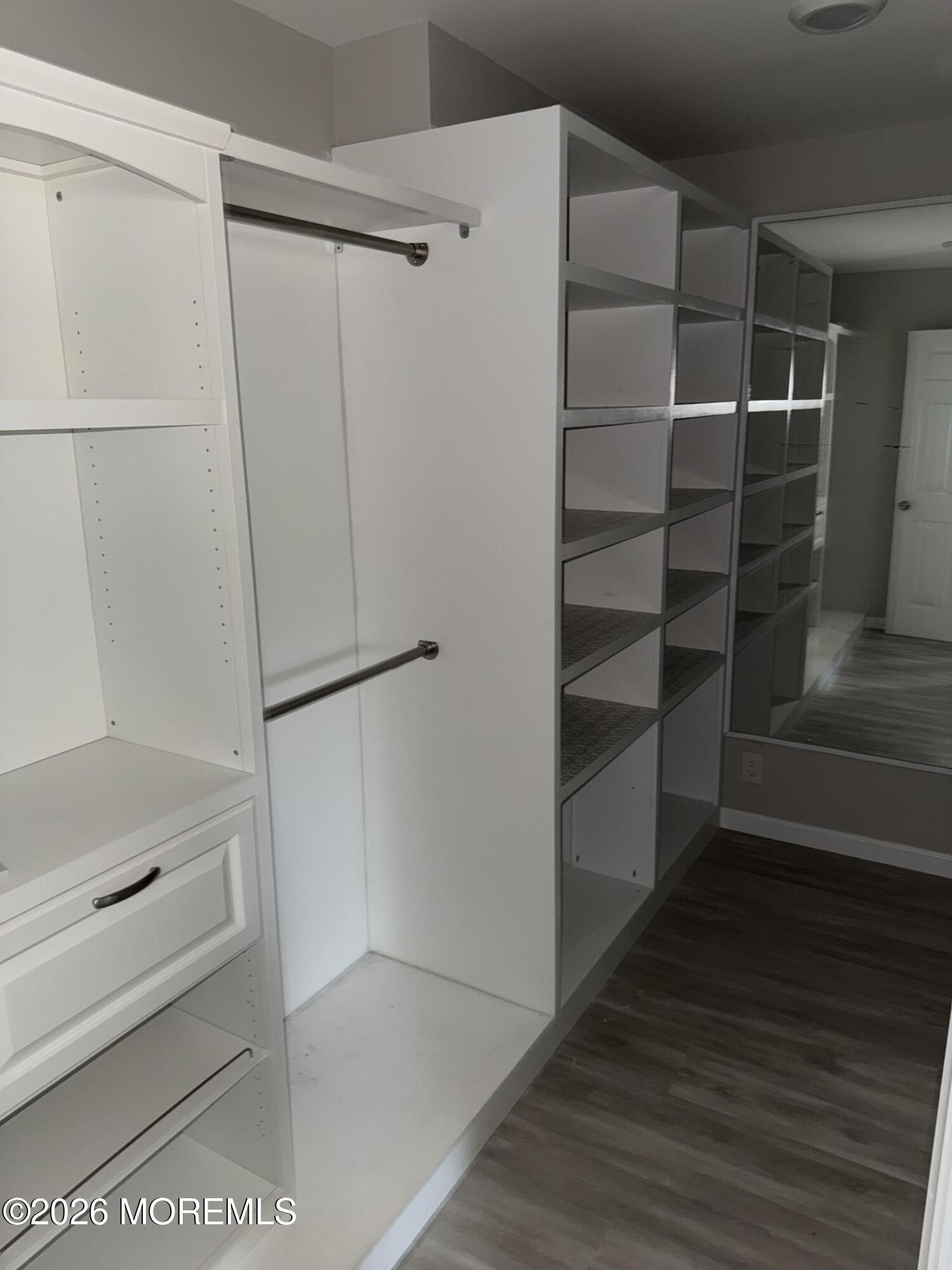 3 Lake Drive Howell, NJ 07731 - Photo 16 of 18 a view of walk in closet with empty racks