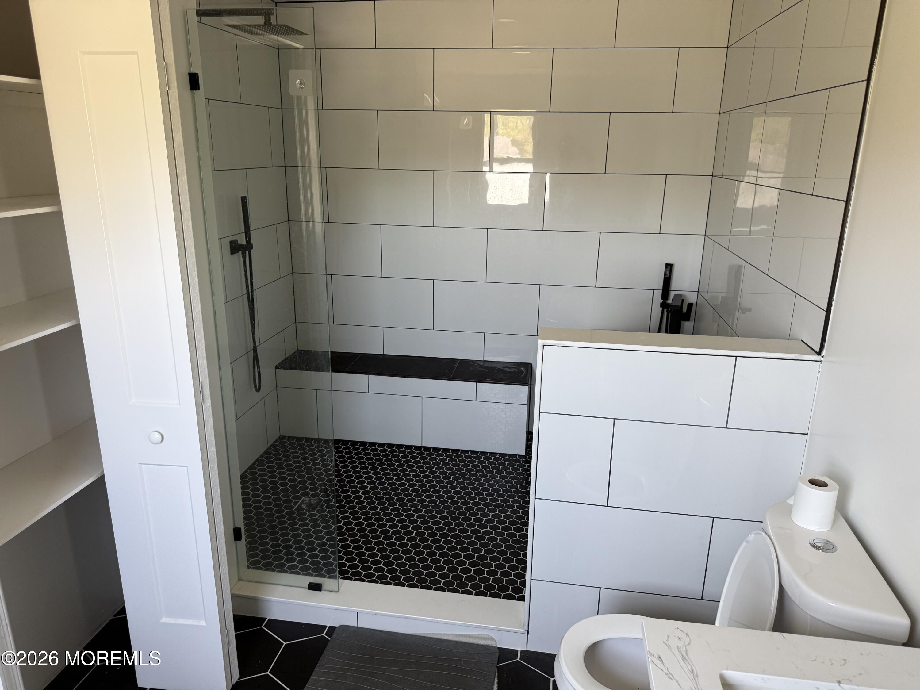 3 Lake Drive Howell, NJ 07731 - Photo 18 of 18 a bathroom with a sink toilet and shower