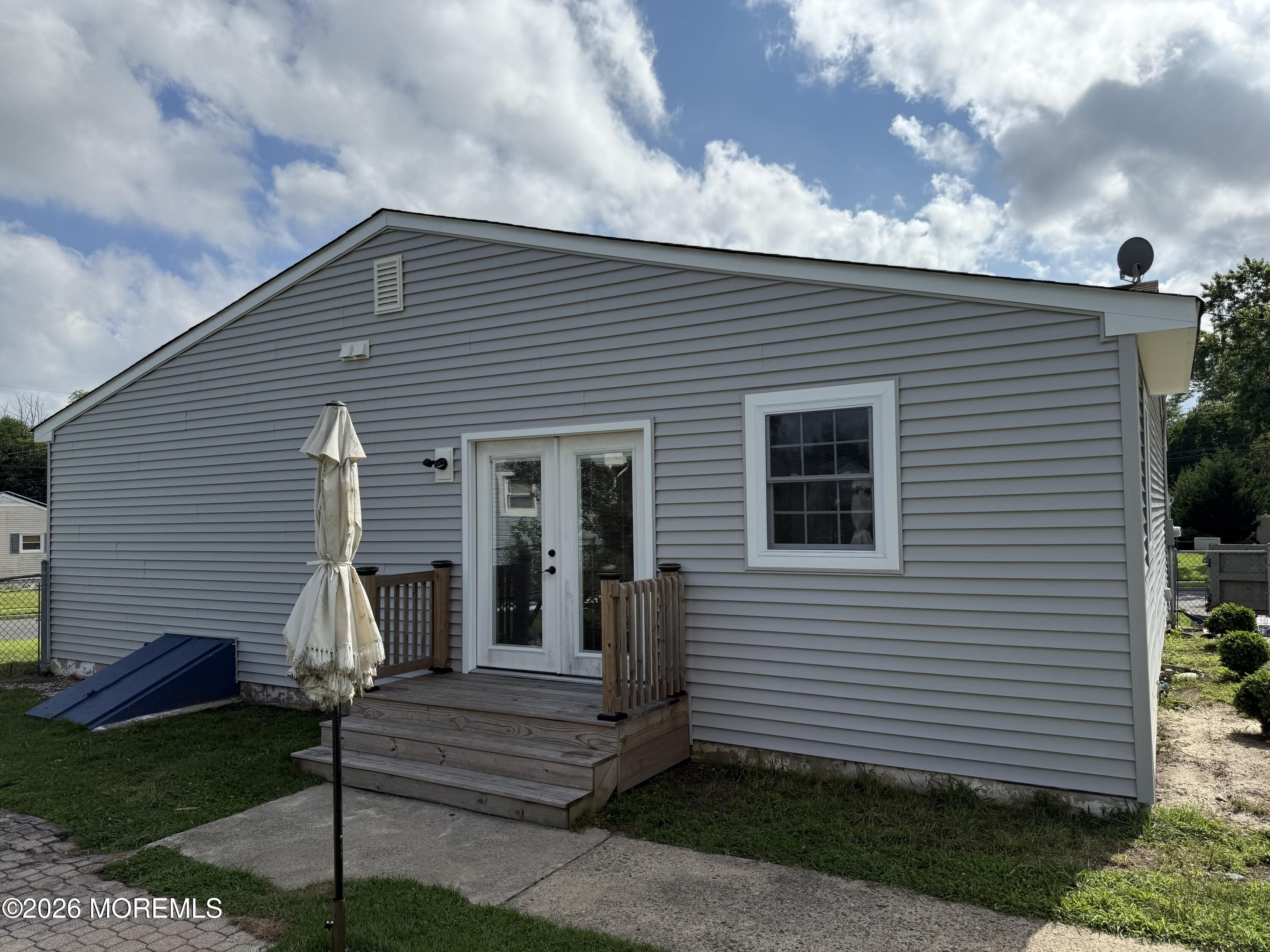 3 Lake Drive Howell, NJ 07731 - Photo 2 of 18 a view of a house with a yard