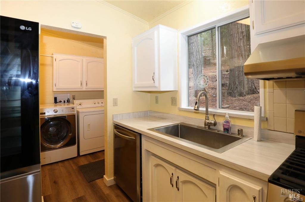 9356 Rockys Road Kelseyville, CA 95451 - Photo 12 of 24 a kitchen that has a sink and a stove top oven
