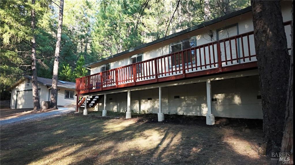 9356 Rockys Road Kelseyville, CA 95451 - Photo 4 of 24 a front view of a house with balcony