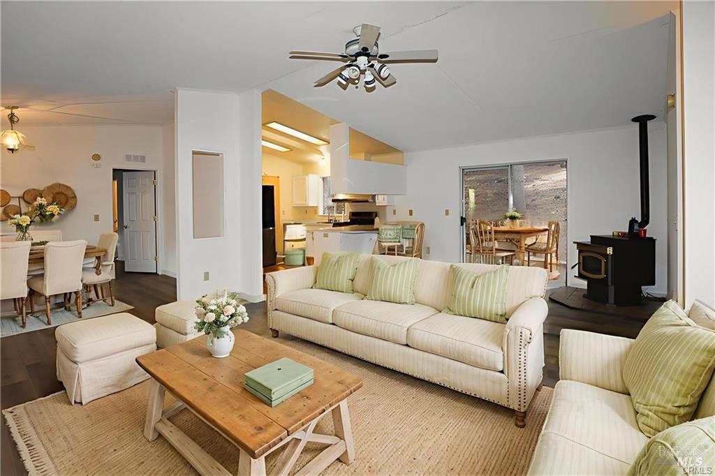 9356 Rockys Road Kelseyville, CA 95451 - Photo 7 of 24 a living room with furniture kitchen view and a chandelier
