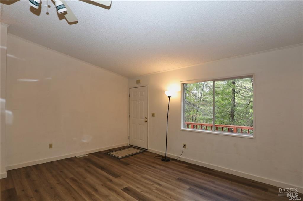9356 Rockys Road Kelseyville, CA 95451 - Photo 8 of 24 a view of an empty room with a window