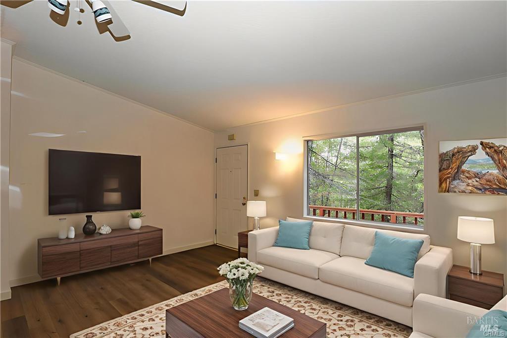 9356 Rockys Road Kelseyville, CA 95451 - Photo 9 of 24 a living room with furniture and a flat screen tv