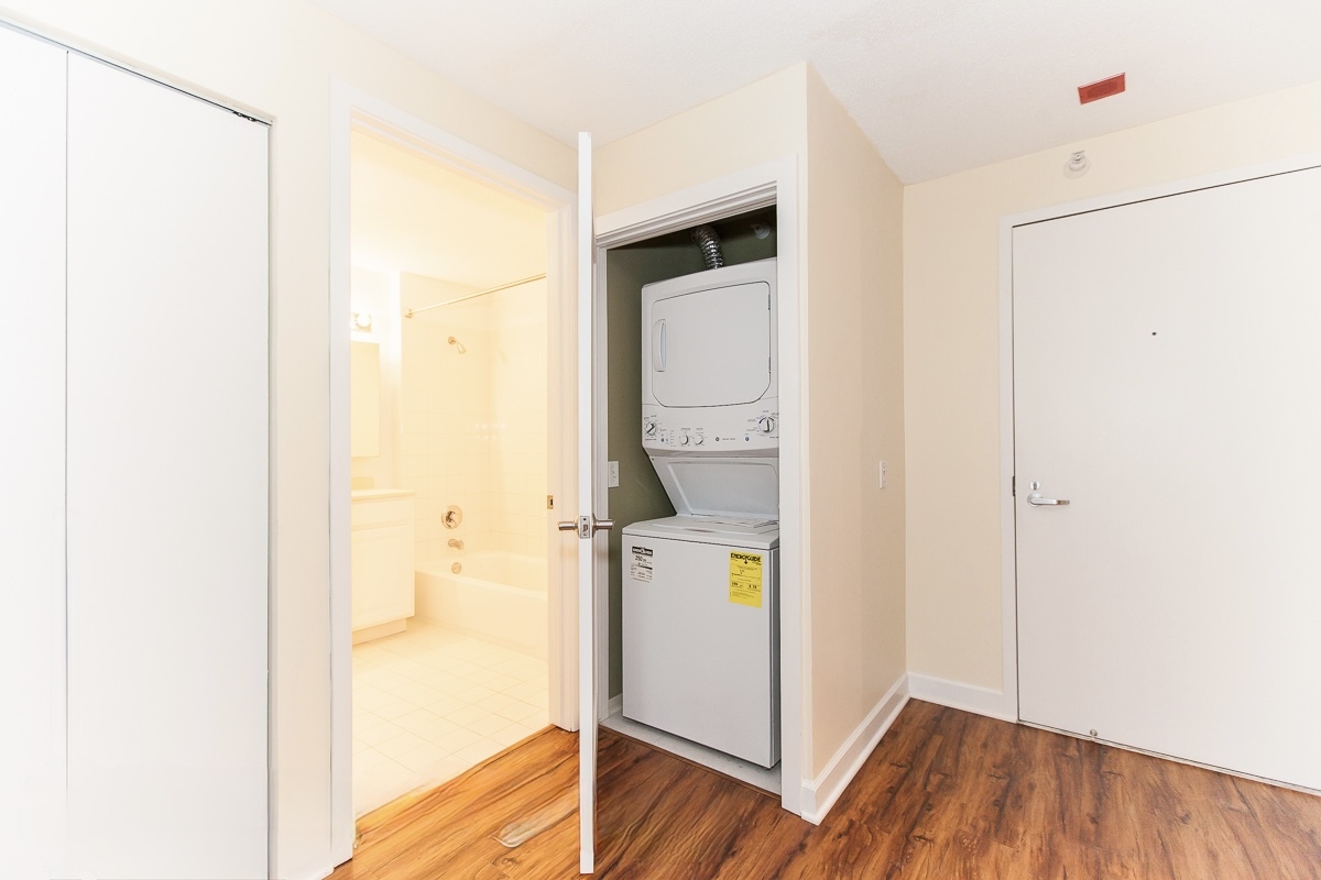545 North Dearborn Street, Unit 902 Chicago, IL 60654 - Photo 8 of 16 a view of a hallway with wooden floor