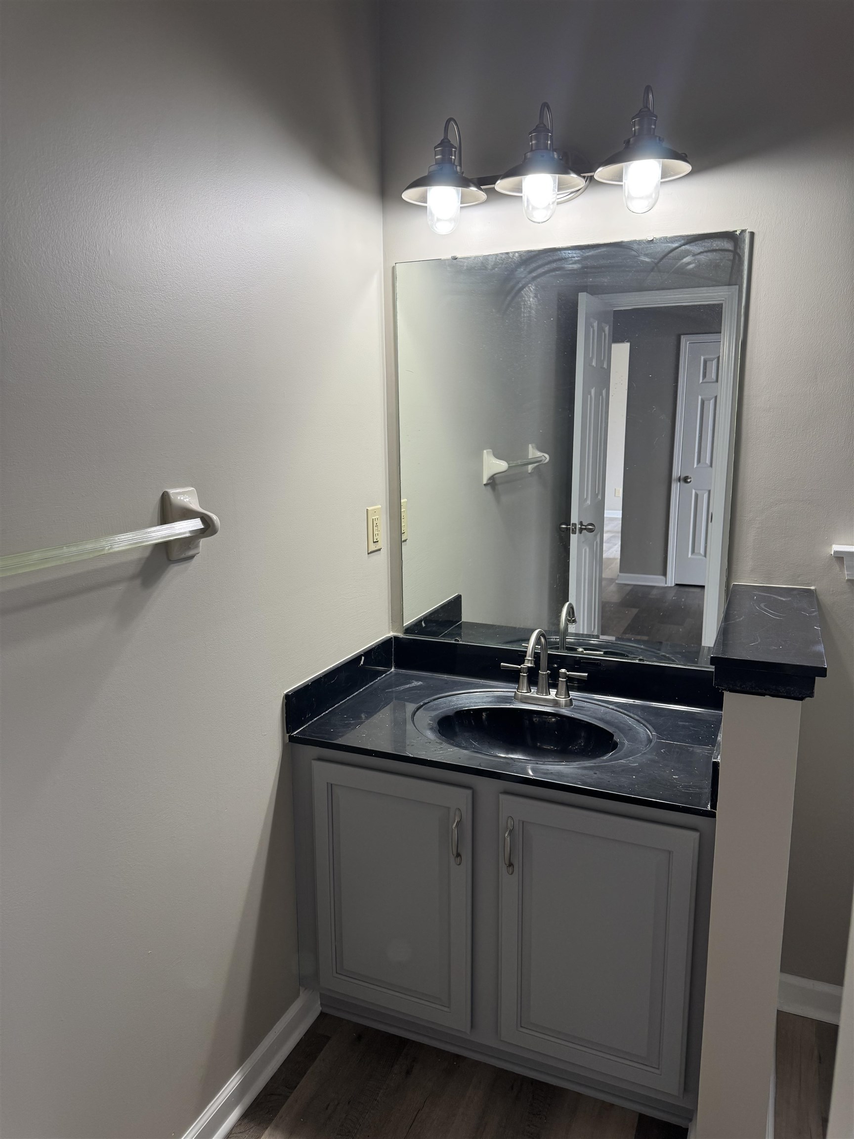 5393 Hightor Lane Memphis, TN 38125 - Photo 18 of 28 a bathroom with a granite countertop sink and a mirror