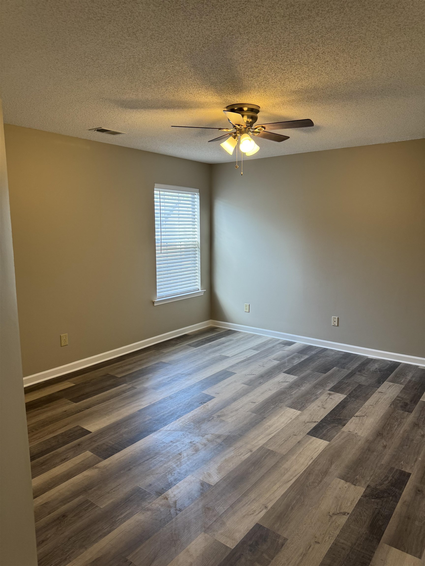 5393 Hightor Lane Memphis, TN 38125 - Photo 8 of 28 a view of an empty room with a window