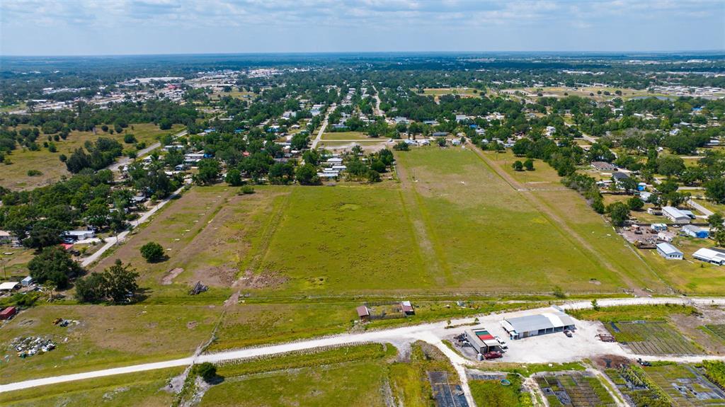 1998 Southeast 1st Avenue Arcadia, FL 34266 - Photo 13 of 16 an aerial view of residential houses with outdoor space