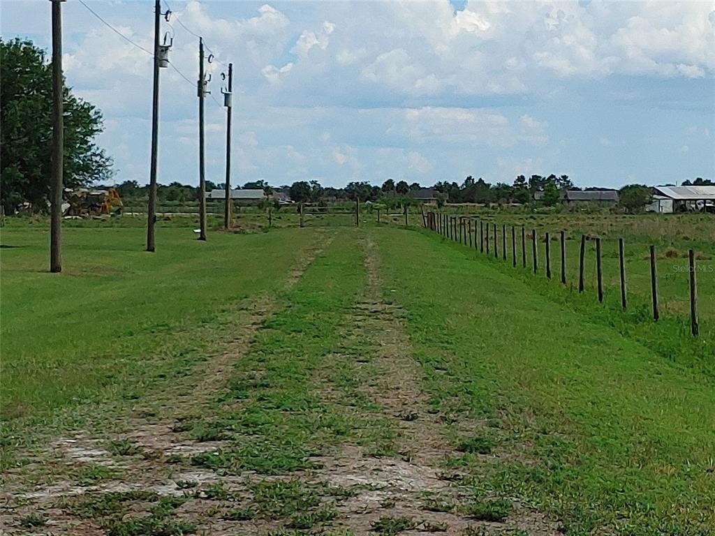 1998 Southeast 1st Avenue Arcadia, FL 34266 - Photo 2 of 16 a view of a lake with a big yard