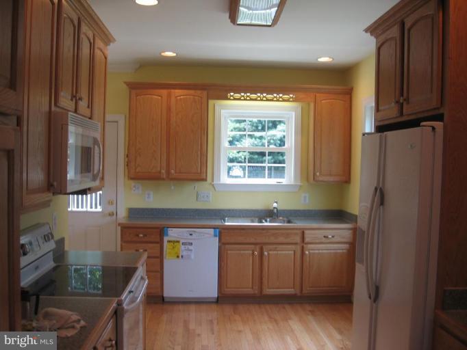 6402 Meadowridge Road Elkridge, MD 21075 - Photo 6 of 21 New Hardwoods; Counters & All Appliances