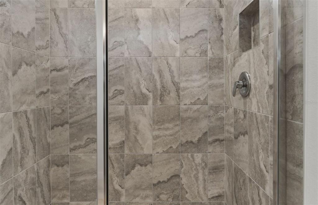 1448 Hamilton Way Lake Alfred, FL 33850 - Photo 12 of 32 a bathroom with a shower