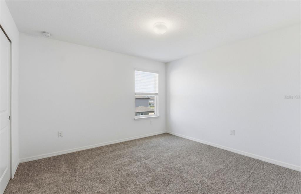 1448 Hamilton Way Lake Alfred, FL 33850 - Photo 16 of 32 a view of an empty room and window