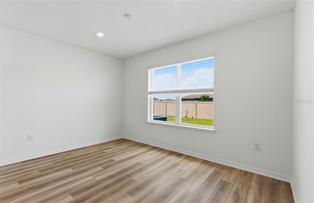1448 Hamilton Way Lake Alfred, FL 33850 - Photo 5 of 32 an empty room with a window