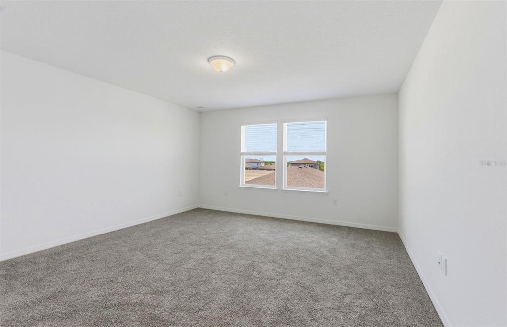1448 Hamilton Way Lake Alfred, FL 33850 - Photo 10 of 32 an empty room with a window