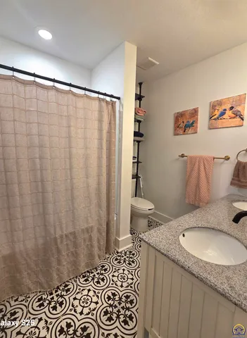 $395,000 | 1432 Southwest MacVicar Avenue, Topeka, KS 66604