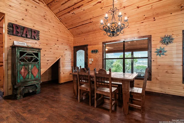 a view of a livingroom with furniture and a fireplace