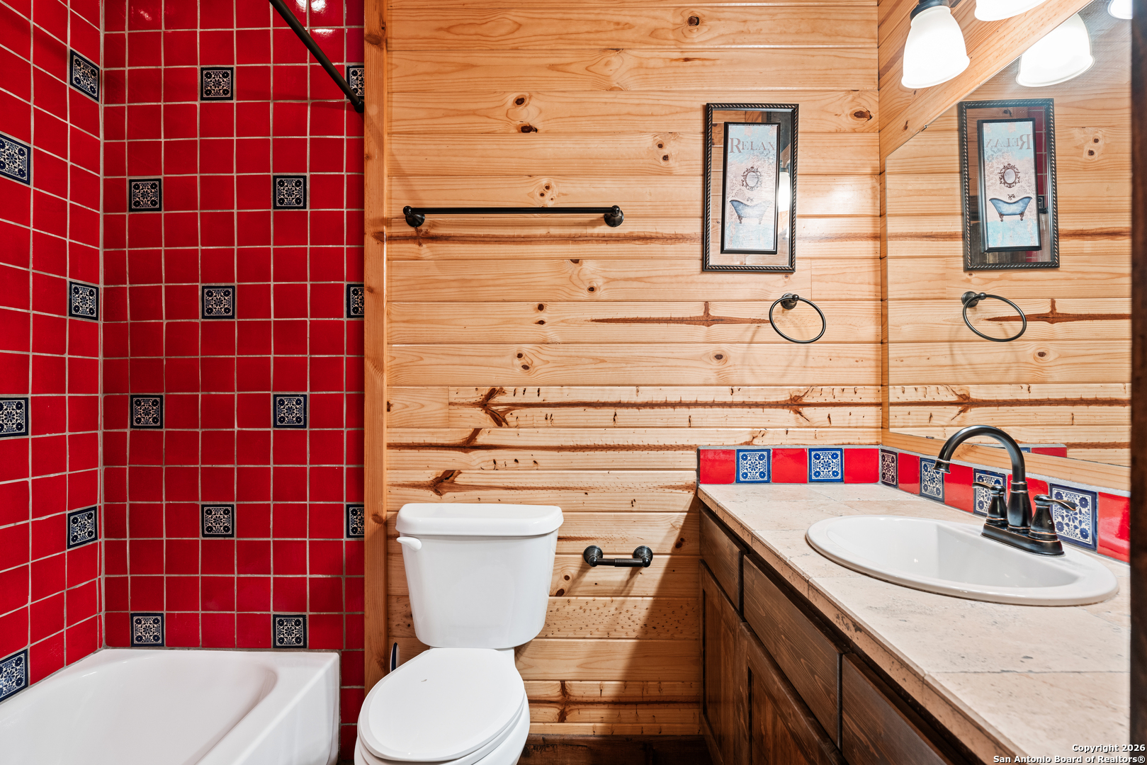 1539 River Road Concan, TX 78838 - Photo 24 of 45 a bathroom with a sink toilet and shower
