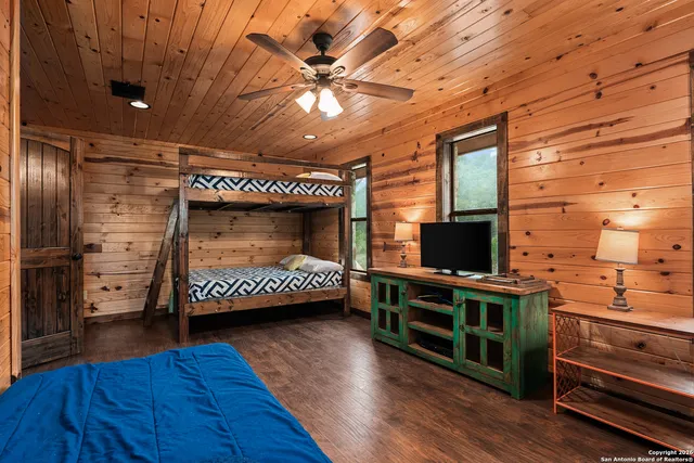 a bathroom with a sink a mirror and a toilet