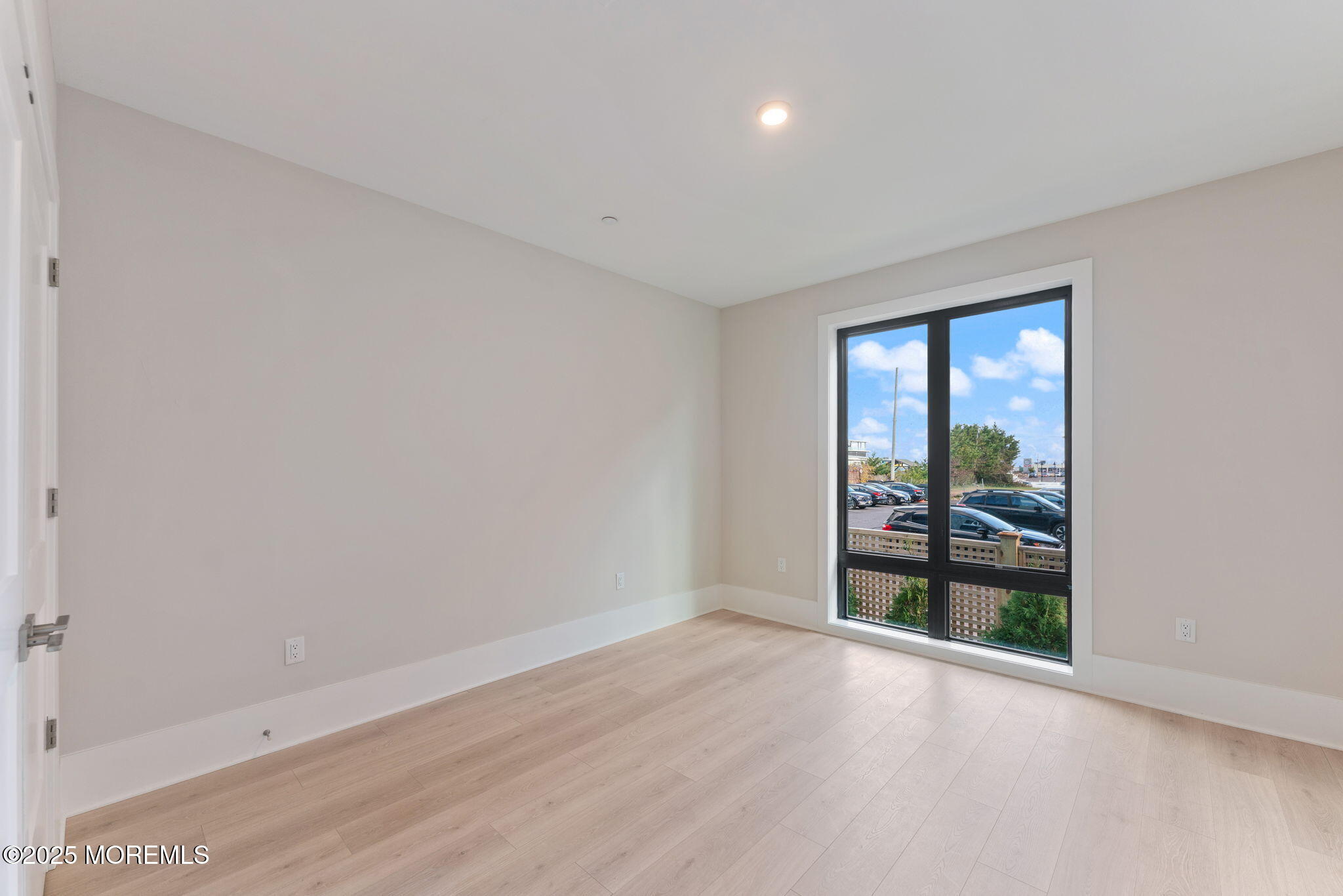 215 2nd Avenue, Unit 103 Asbury Park, NJ 07712 - Photo 11 of 33 wooden floor in an empty room