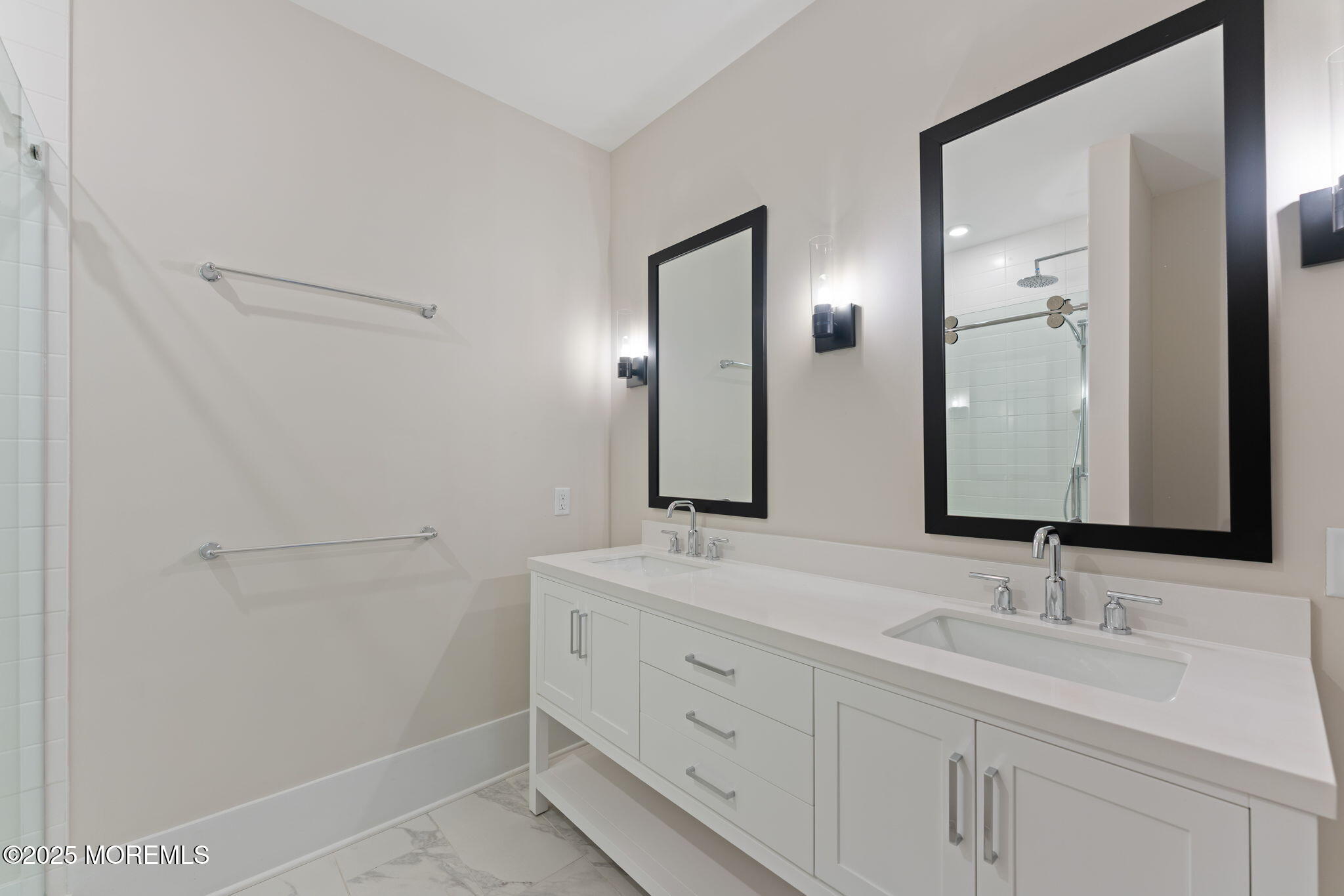 215 2nd Avenue, Unit 103 Asbury Park, NJ 07712 - Photo 19 of 33 a bathroom with a double vanity sink and mirror