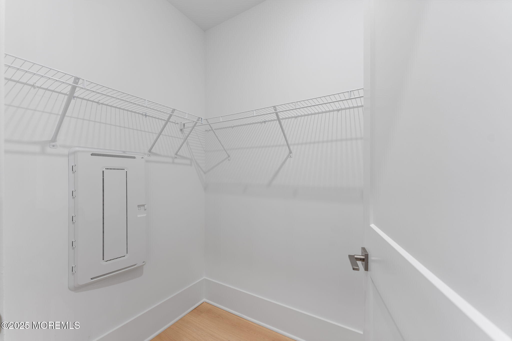 215 2nd Avenue, Unit 103 Asbury Park, NJ 07712 - Photo 25 of 33 a view of a room with racks on the wall