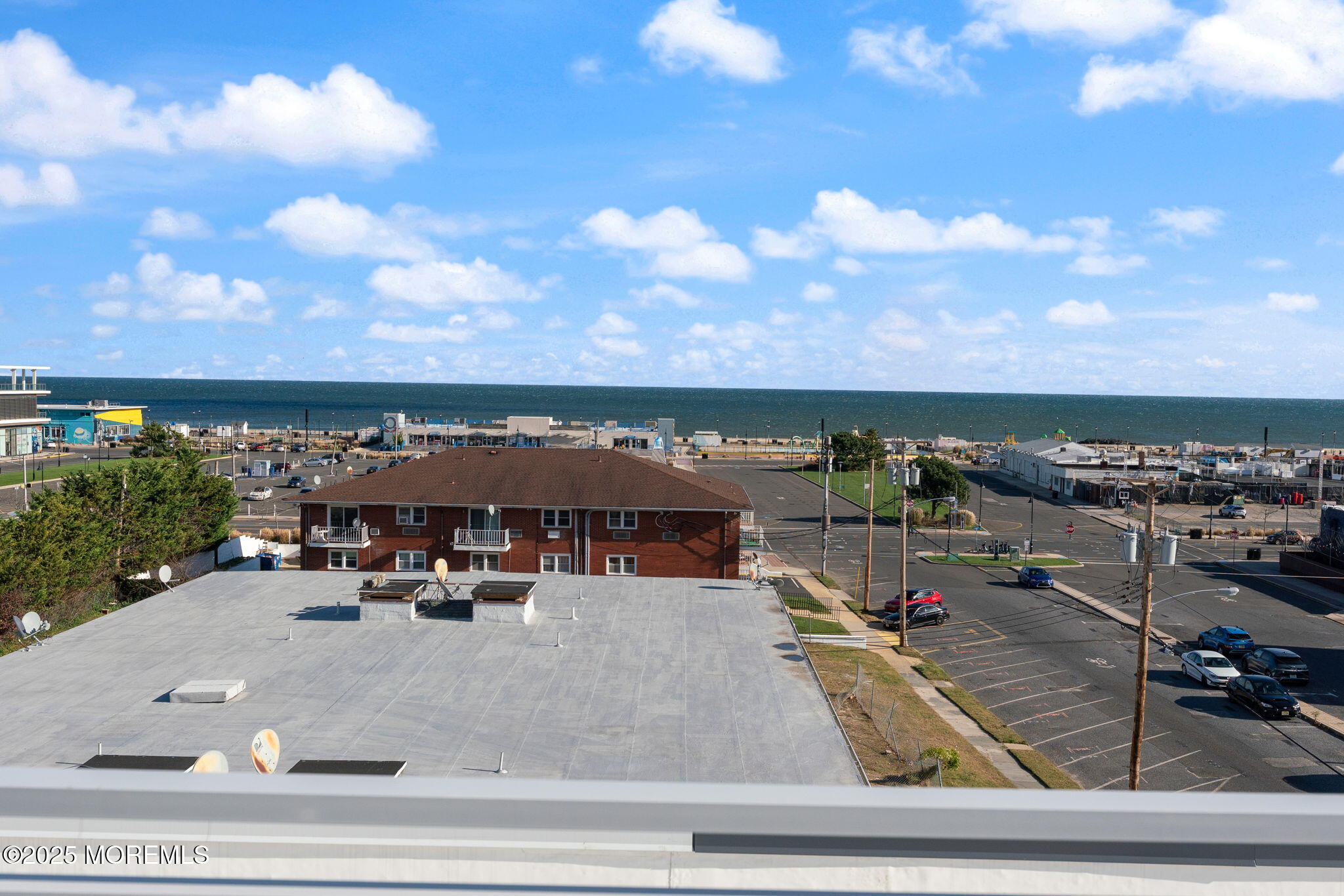 215 2nd Avenue, Unit 103 Asbury Park, NJ 07712 - Photo 30 of 33 a view of a swimming pool and lake view
