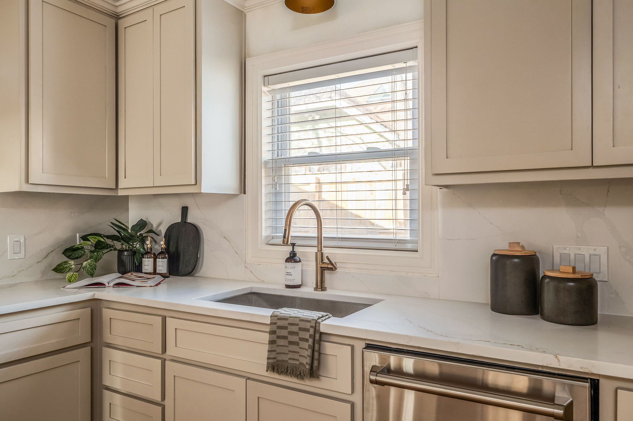 3801 Avenue H Austin, TX 78751 - Photo 20 of 40 a kitchen with a sink and cabinets