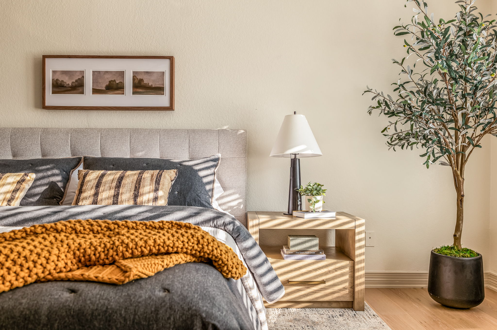 3801 Avenue H Austin, TX 78751 - Photo 26 of 40 a bedroom with a bed and a potted plant