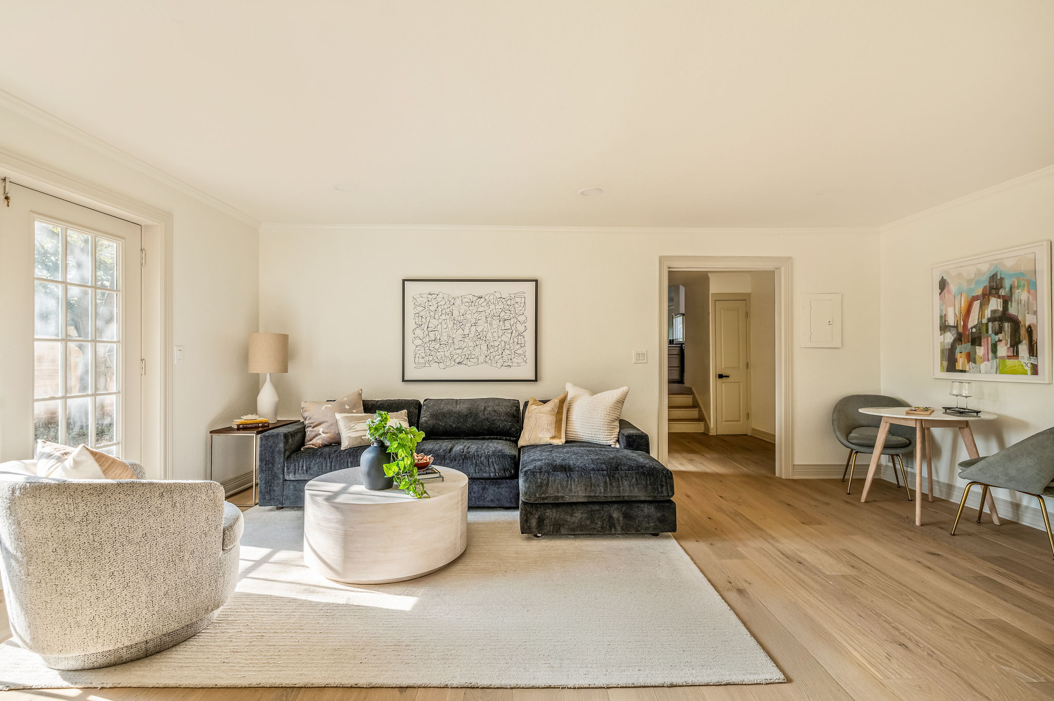 3801 Avenue H Austin, TX 78751 - Photo 33 of 40 a living room with furniture and a wooden floor