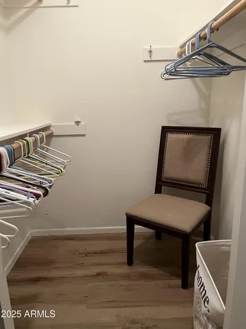 a bathroom with a granite countertop shower and a sink