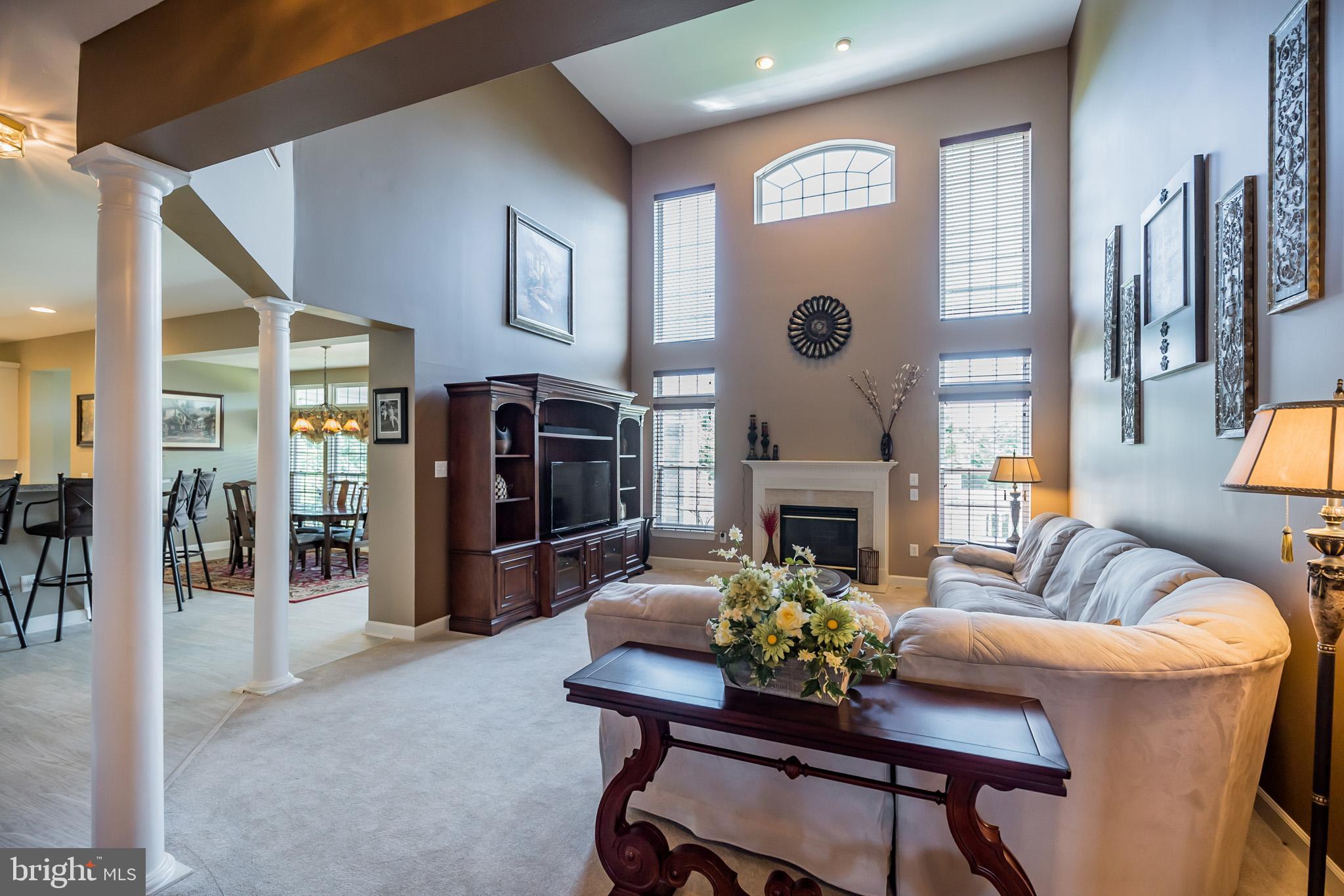 114 Quail Ridge Way Mickleton, NJ 08056 - Photo 4 of 40 Great room with two-story ceilings and fireplace.