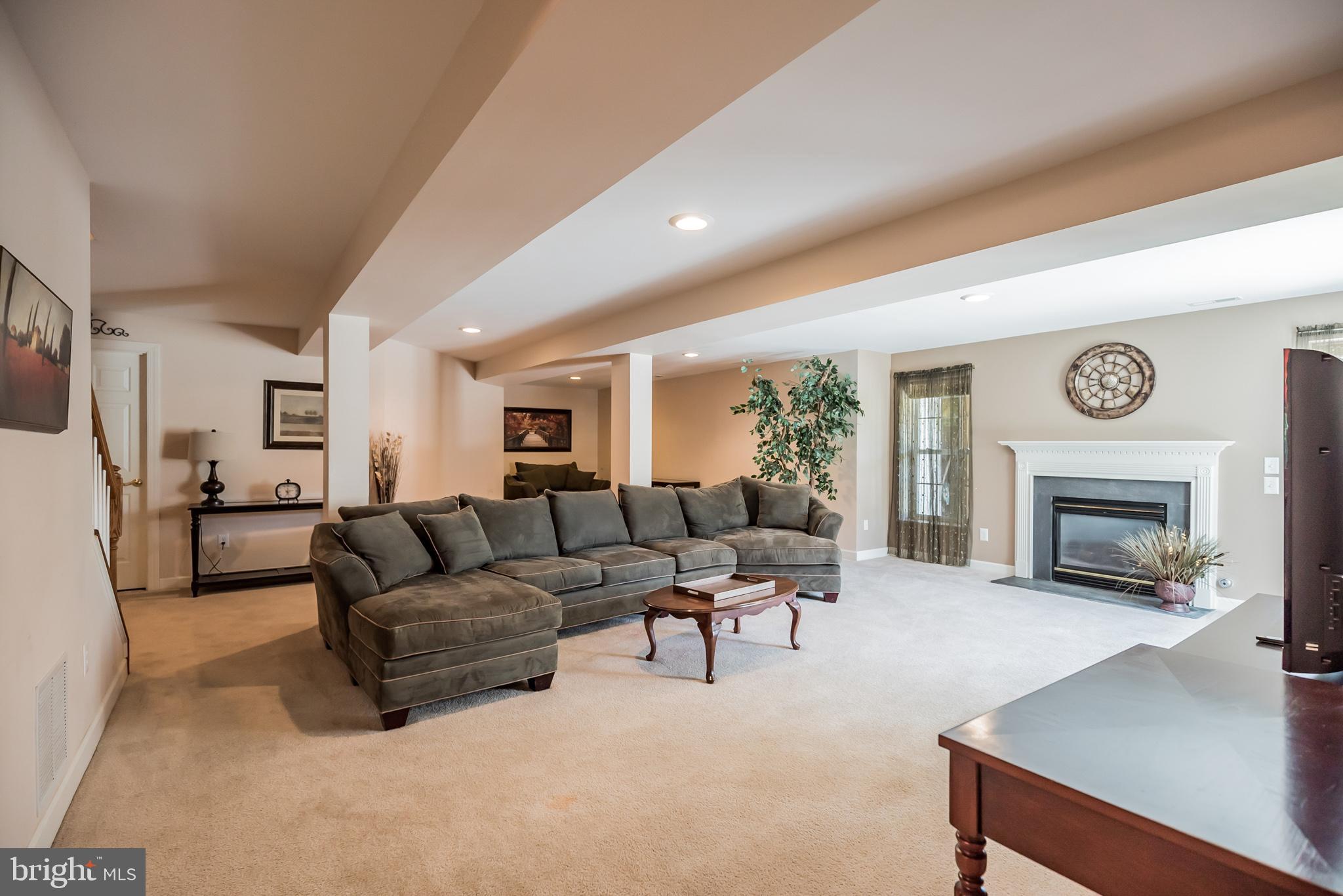114 Quail Ridge Way Mickleton, NJ 08056 - Photo 6 of 40 Finished basement family room with fireplace