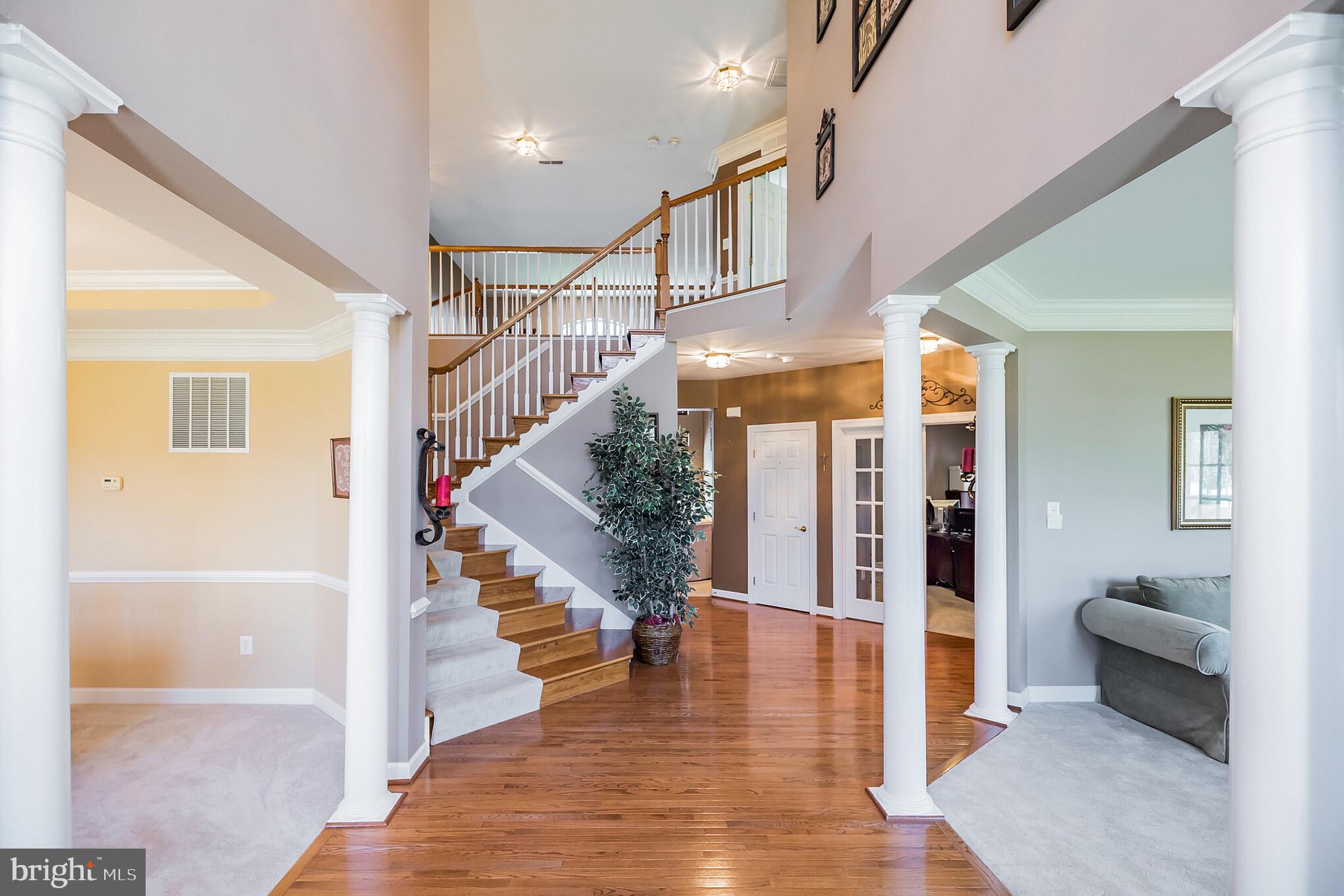 114 Quail Ridge Way Mickleton, NJ 08056 - Photo 9 of 40 Grand two-story foyer with fanned staircase.