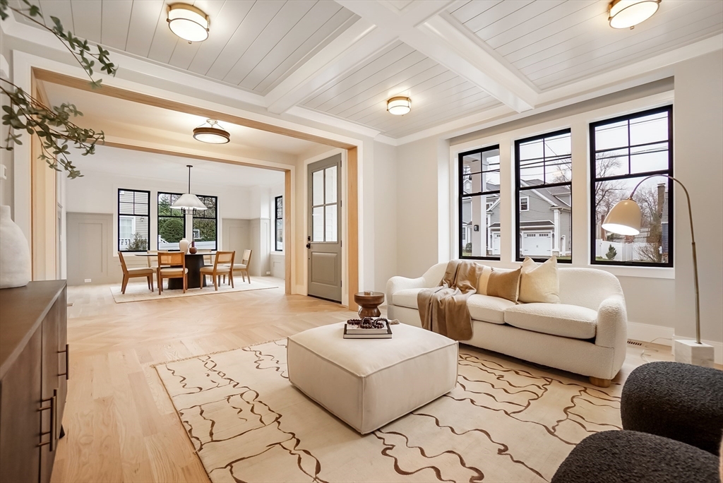 407 High Rock Street Needham, MA 02492 - Photo 2 of 36 a living room with furniture and large windows