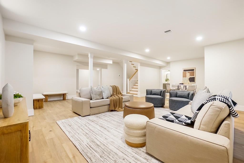 407 High Rock Street Needham, MA 02492 - Photo 29 of 36 a living room with furniture and a couch