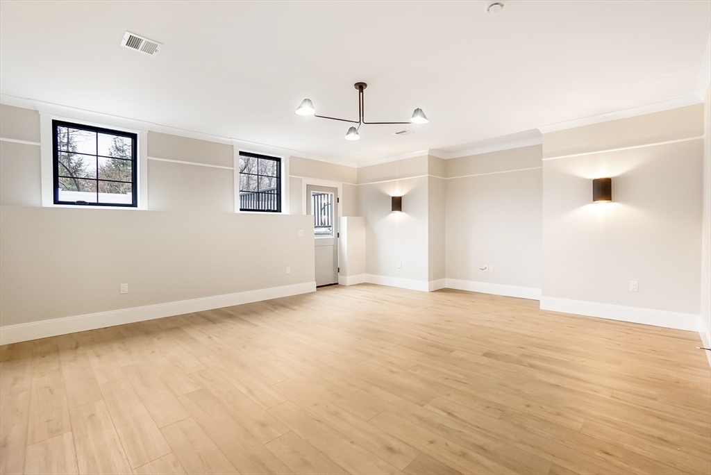407 High Rock Street Needham, MA 02492 - Photo 32 of 36 a view of an empty room with glass door