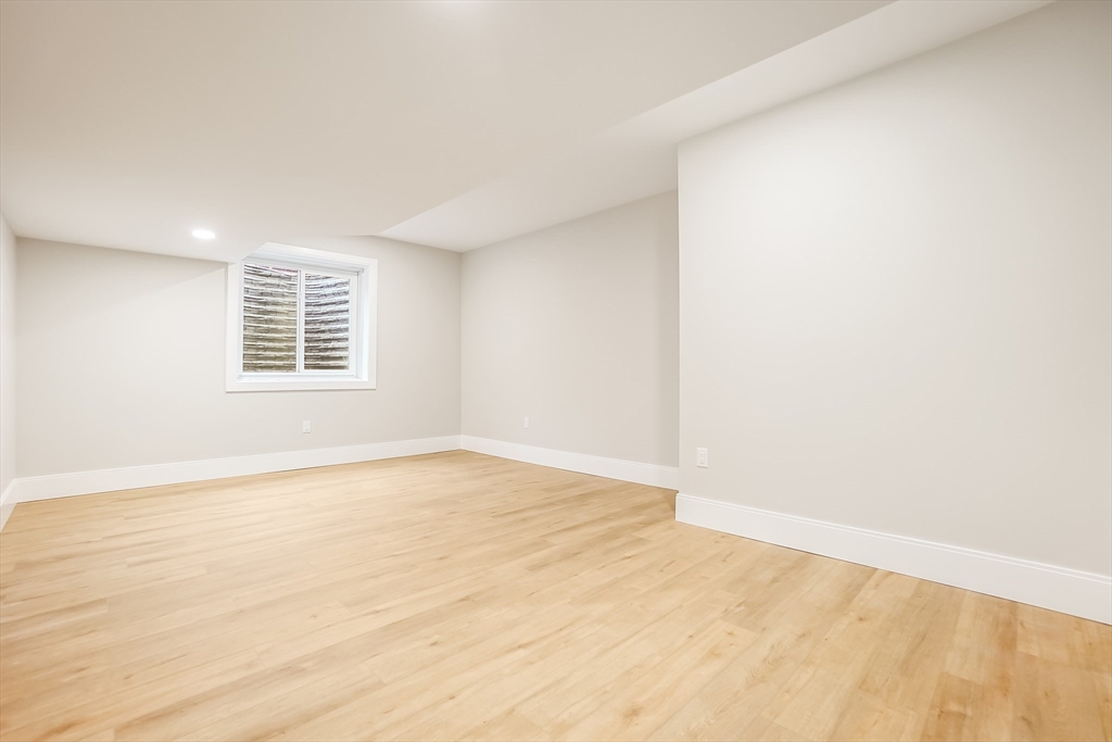 407 High Rock Street Needham, MA 02492 - Photo 34 of 36 a view of an empty room with a window